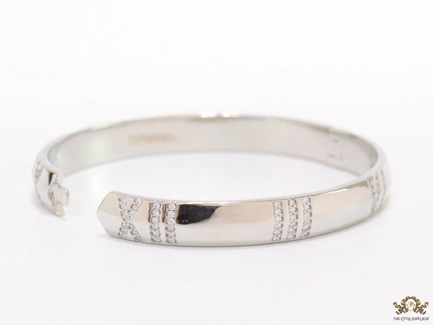 Platinum plated bracelet with cz roman numerals