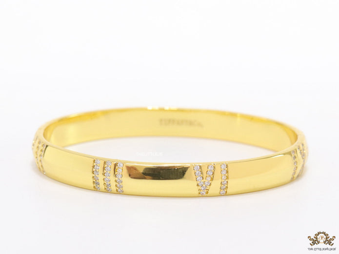 Gold bracelet with cz roman numerals