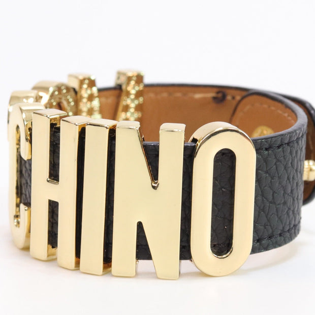 Alphabet M black colour bracelet in gold finish
