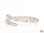 Open top platinum plated minimal snake bracelet with cubic zirconia stones and pearl white stones.