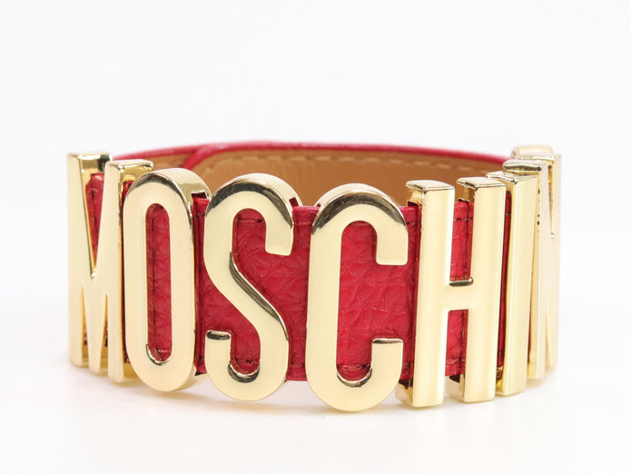 Alphabet M red colour bracelet in gold finish