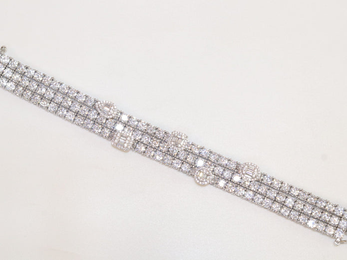 Triple Stacked multiple cut CZ bracelet in platinum finish