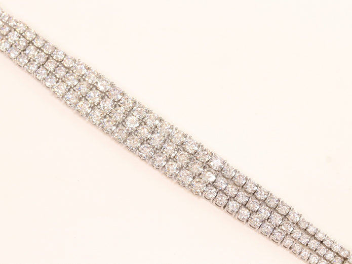Triple Stacked CZ bracelet in platinum finish