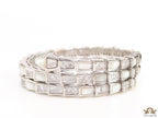 Triple line platinum plated minimal serpentine bracelet with cubic zirconia stones and pearl white stones.