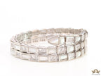 Triple line platinum plated minimal serpentine bracelet with cubic zirconia stones and pearl white stones.