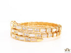Triple line gold plated minimal serpentine bracelet with cubic zirconia stones and pearl white stones.