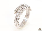 Triple line platinum plated minimal serpentine bracelet with cubic zirconia stones and pearl white stones.