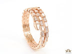 Triple line rose gold plated minimal serpentine bracelet with cubic zirconia stones and pearl white stones.