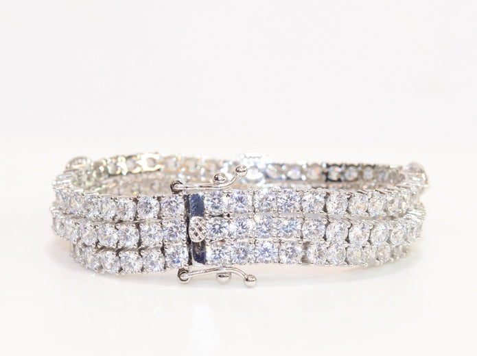Triple Stacked multiple cut CZ bracelet in platinum finish