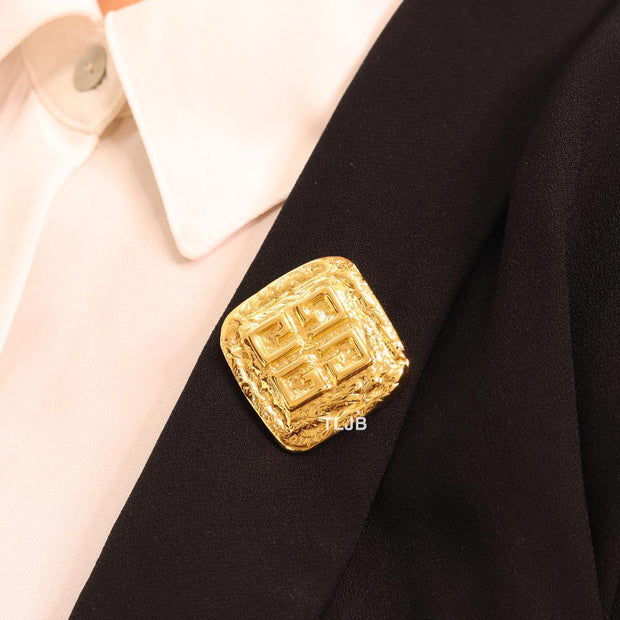 Small brass gold brooch