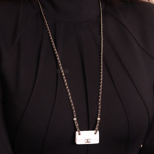 Double C enamel Bag on a black and gold chain
