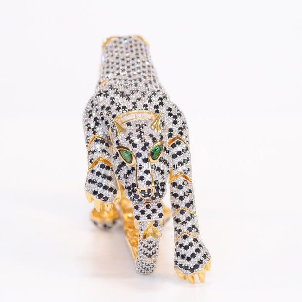 Cubic zirconia stone studded panther motif with emerald green colour stone details gold plated bracelet