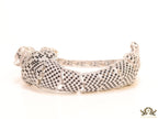Cubic zirconia stone studded panther motif with emerald green colour stone details platinum plated bracelet