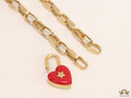 Golden link chain necklace with heart shape lock pendant