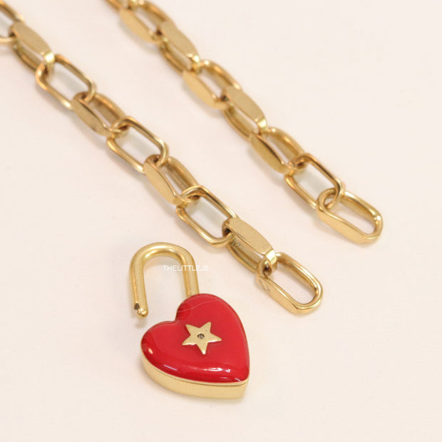 Golden link chain necklace with heart shape lock pendant