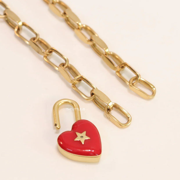 Golden link chain necklace with heart shape lock pendant