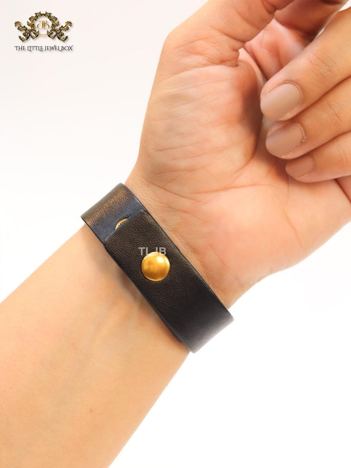 Alphabet D and black belted bracelet