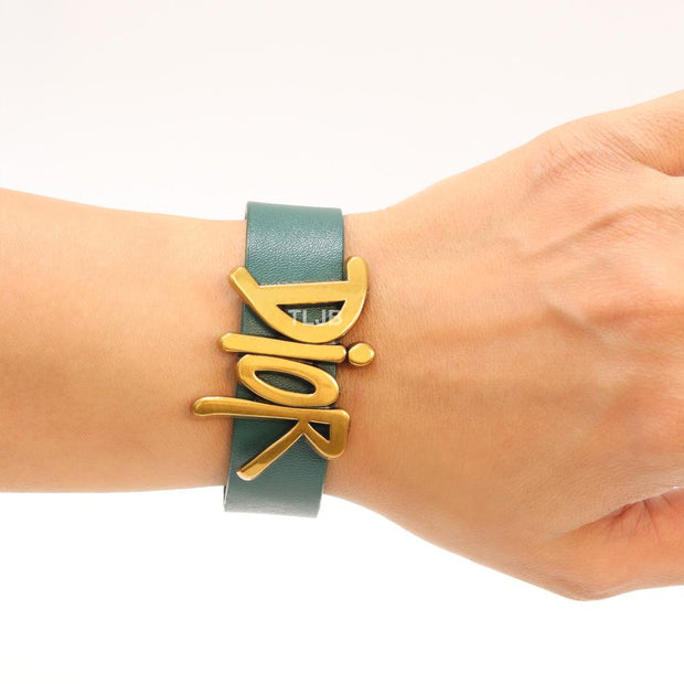 Alphabet D and green belted bracelet
