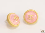 Pink and golden round studs with twin C motif