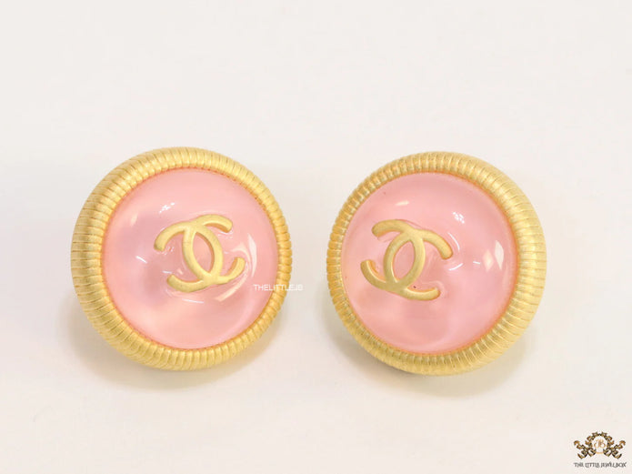 Pink and golden round studs with twin C motif