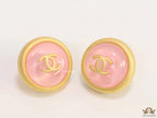 Pink and golden round studs with twin C motif