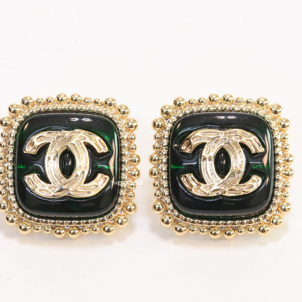 Square deep green and golden stud earrings with golden twin C motifs