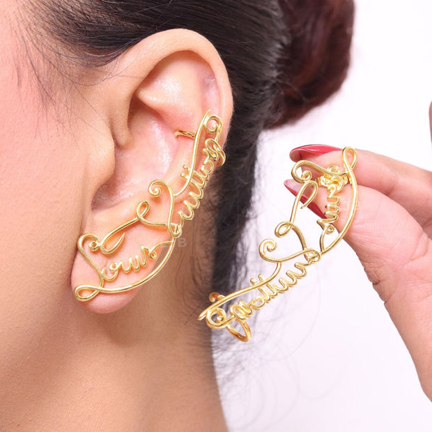 Alphabet L and V ear-cuffs in gold