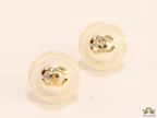 White acrylic studs with pearl and twin C motif