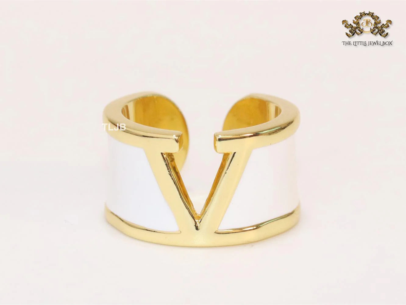 Open V and white enamel bold ring