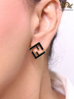 Black Double F gold studs
