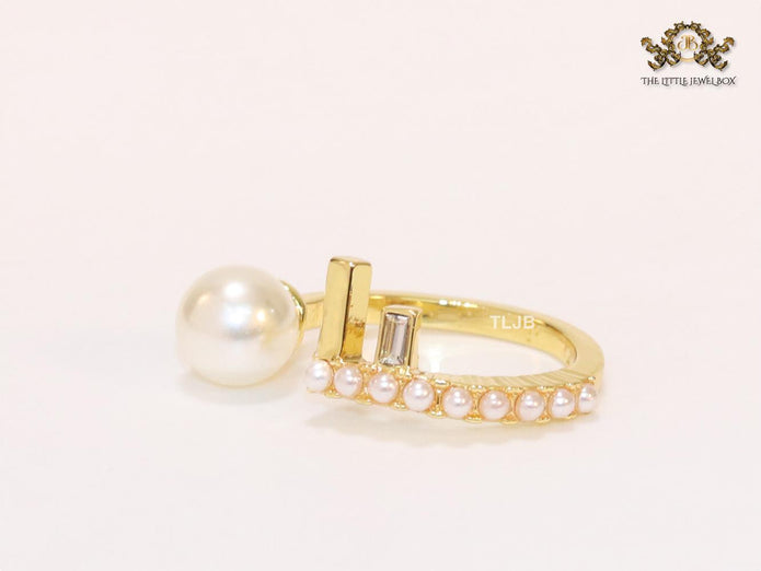 Pearl and alphabet F open ring