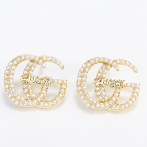 Double G pearl earrings in gold finish