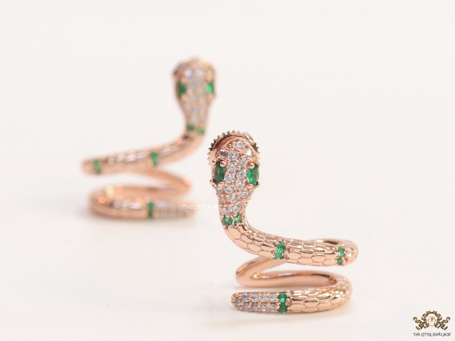 Rose gold plated ear cuff pattern snake earrings with green cz