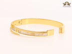White & gold sleek screw bracelet