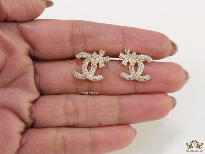 Gold plated flower and twin C motif cz studs