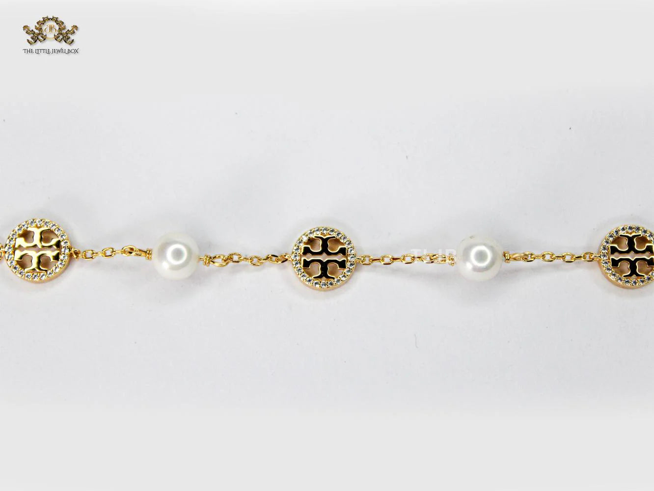 Alphabet T chain pearl studded bracelet