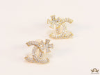 Gold plated flower and twin C motif cz studs