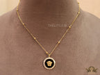 Gold plated Athena necklace in black base