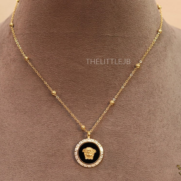 Gold plated Athena necklace in black base