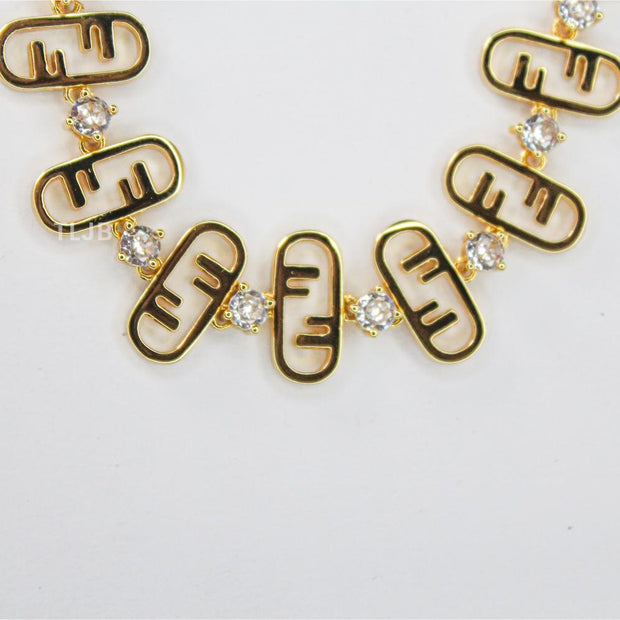 Alphabet F studded gold bracelet