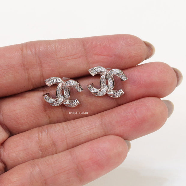 Platinum plated entwined twin C motif cz studs