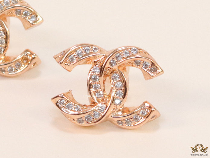 Rose gold plated entwined twin C motif cz studs