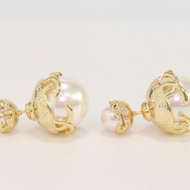Double C white pearl studs in gold finish