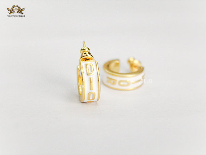 Alphabet D white hoops with gold detaling
