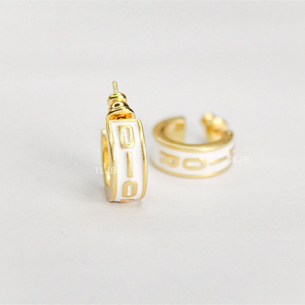 Alphabet D white hoops with gold detaling