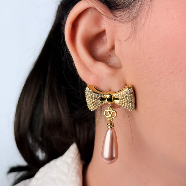 Gold Bow Alphabet V Drop Earrings with Pink Pearl