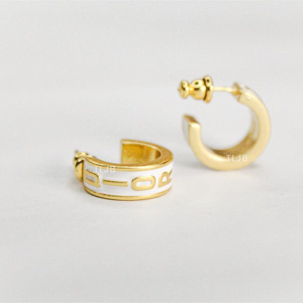 Alphabet D white hoops with gold detailing