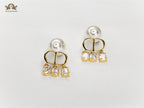 Alphabet C D pearl bomber earrings with cz