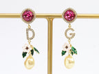 Alphabet D and G multicoloured long dangles in gold finish with cz