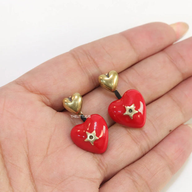 Golden and red detachable studs with twin hearts